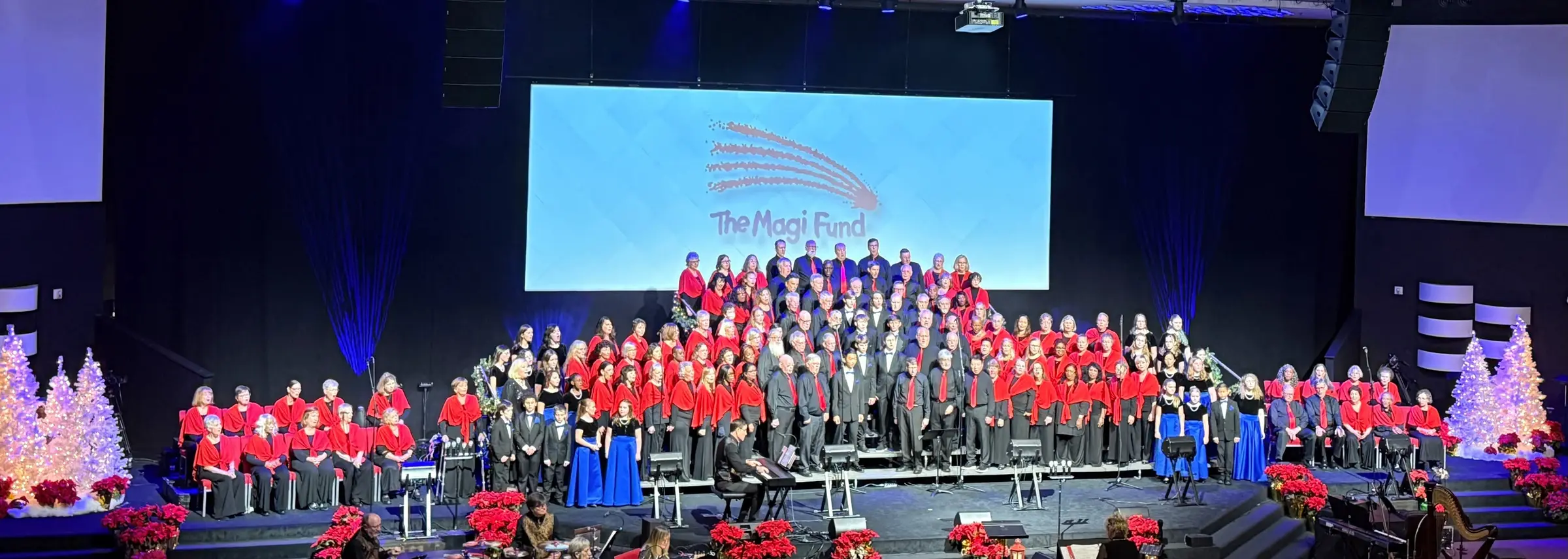 A massed community holiday concert with the choir on stage